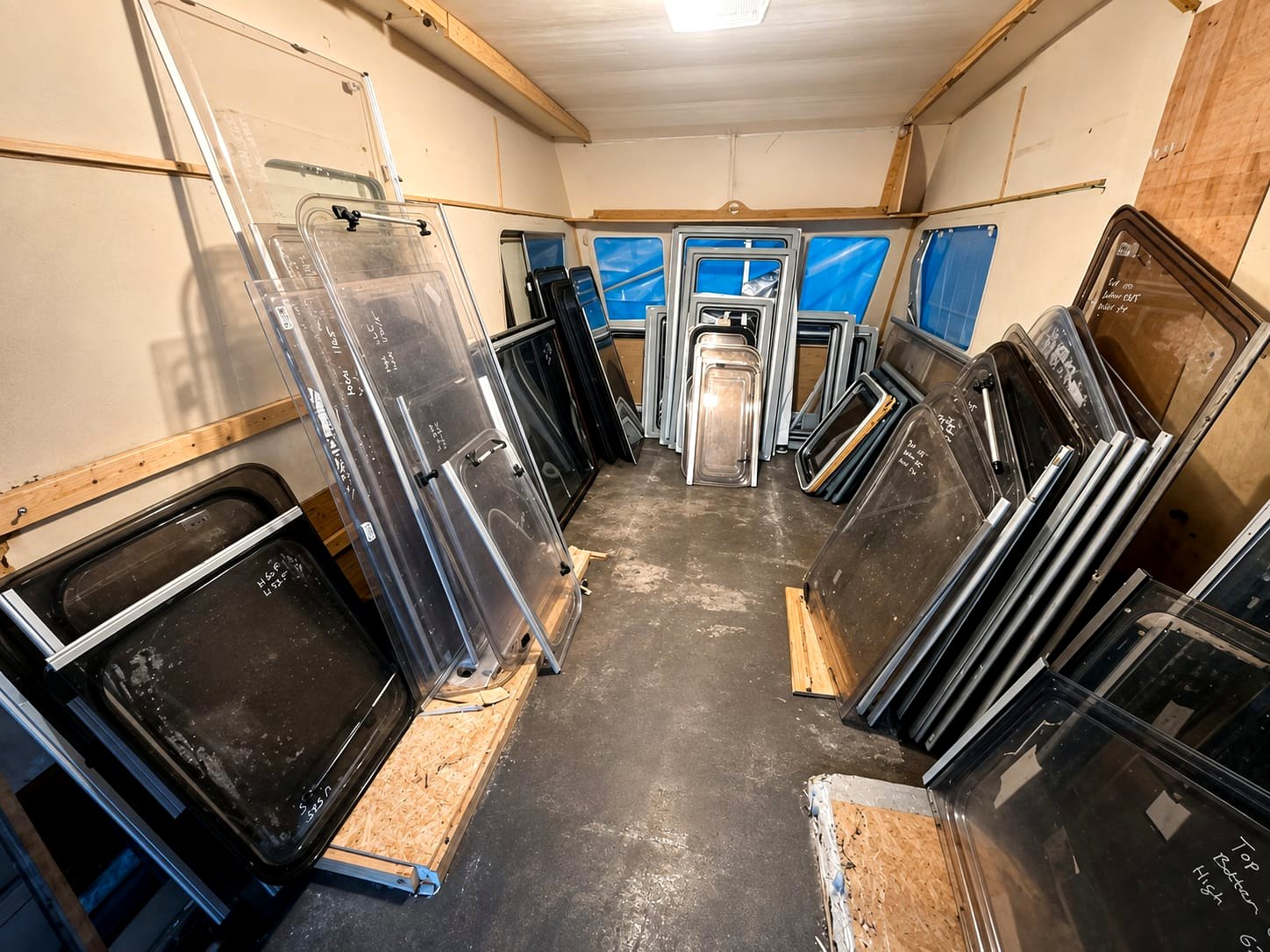 Caravan windows measured, labelled and stored under cover
