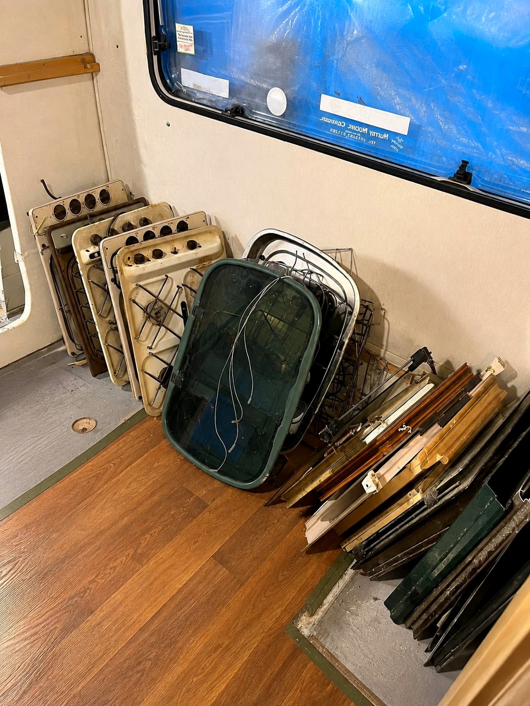Caravan cookers, hobs and hob glass lids stored inside the unit